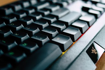 Close-Up Photo of Black Razer Computer Keyboard