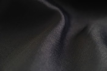 Close-up Photo of Black Textile