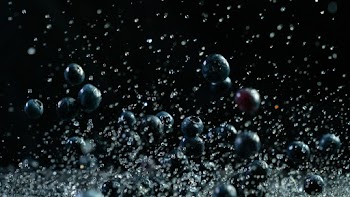 Close-Up Photo of Blueberries in Black Background