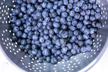 Close-Up Photo of Blueberries in Strainer