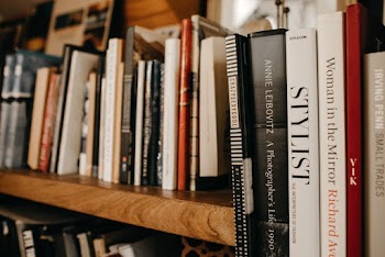 Close-Up Photo Of Books On Shelf