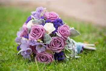 Close-Up Photo of Bouquet Of Flowers On Grass