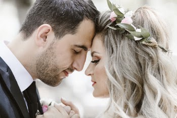 Close-Up Photo Of Bride And Groom 
