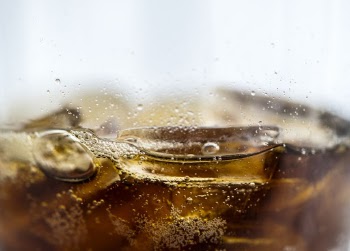 Close-up Photo Of Brown Beverage