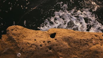 Close-up Photo of Brown Rocky Cliff