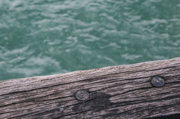 Close-up Photo of Brown Wooden Fence