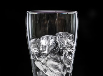 Close-Up Photo of Clear Drinking Glass Filled With Ice