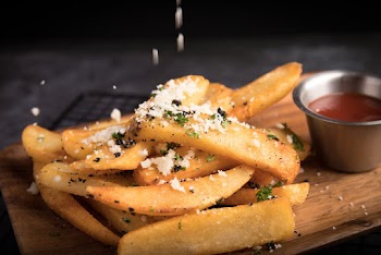 Close Up Photo Of Deep Fried Potatoes