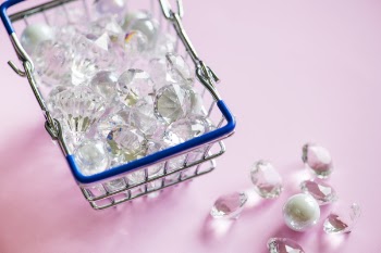 Close-Up Photo Of Diamonds On Basket