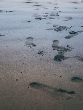 Close Up Photo of Foot Prints