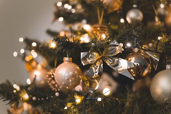Close-Up Photo of Gold And Silver Christmas Ornaments