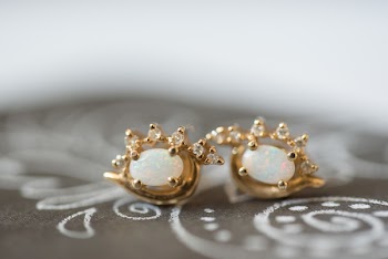 Close-Up Photo of Golden Earrings