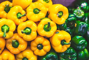 Close-up Photo of Green and Yellow Bell Peppers 