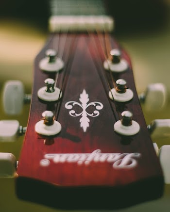 Close-up Photo of Guitar Headstock