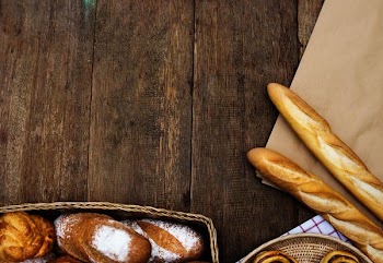 close up photo of leavened breads on basket