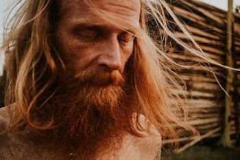 Close-Up Photo of Man Closing His Eyes