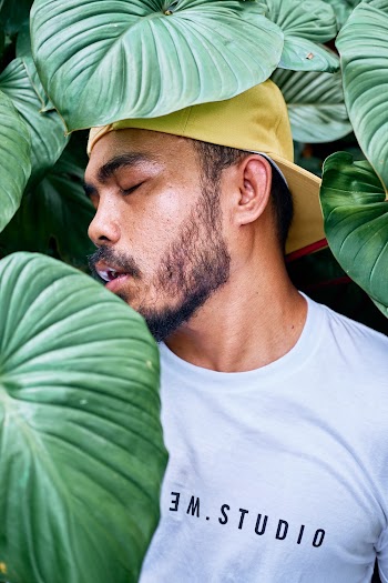 Close-Up Photo of Man in White Crew-neck Shirt