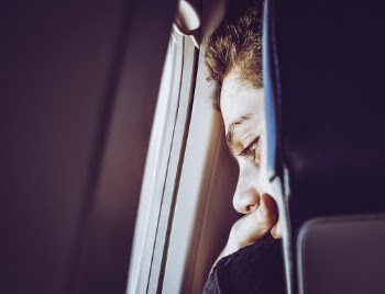 Close-Up Photo of Man Looking Down