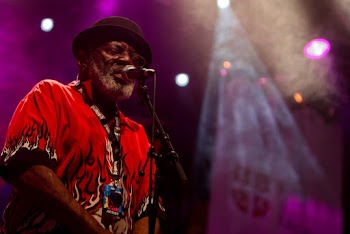 Close-Up Photo of Man Singing