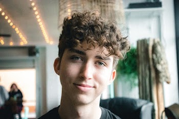 Close-Up Photo of Man Smiling