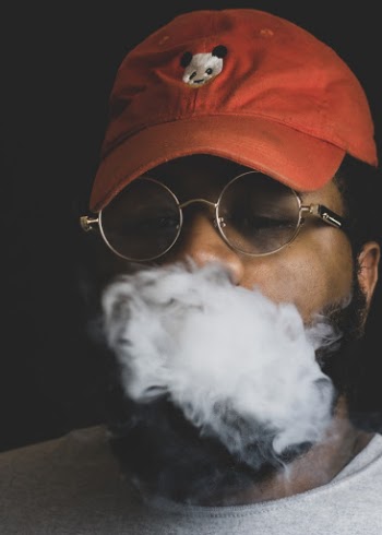 Close-Up Photo of Man Smoking