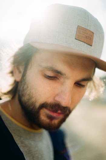Close-Up Photo of Man Wearing Cap