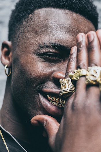 Close-Up Photo of Man Wearing Gold Rings