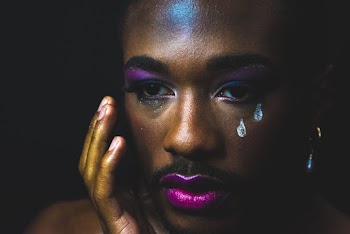 Close-up Photo of Man Wearing Make Up