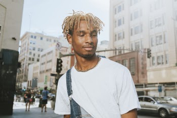 Close-Up Photo of Man With Dreadlocks