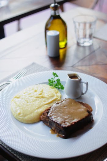 Close-Up Photo of Mashed Potato and Steak