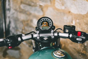 Close-Up Photo of Motorcycle Handlebar