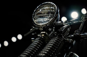 Close-up Photo of Motorcycle Headlight
