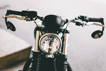 Close-Up Photo of Motorcycle Headlight