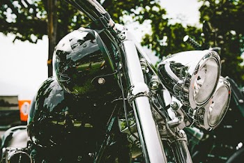 Close-Up Photo of Motorcycle Headlight