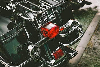 Close-Up Photo of Motorcycle Tail Lights
