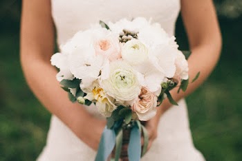 Close-Up Photo of Person Holding Bouquet