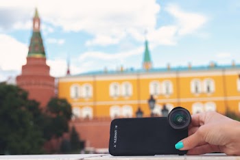 Close-Up Photo of Person Holding Mobile Phone