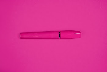 Close-Up Photo Of Pink Container