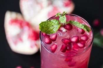Close-up Photo of Pink Juice in Clear Drinking Glass