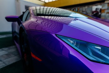 Close-Up Photo of Purple Vehicle