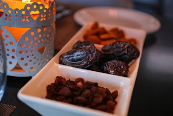 Close-Up Photo of Raisins and Dates