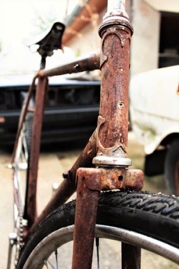 Close-up Photo of Rusted Bicycle Body Frame