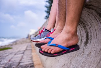 Close-Up Photo of Shoes And Slippers