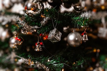 Close-Up Photo of Silver Christmas Decorations