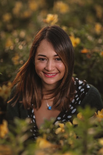 Close-Up Photo Of Smiling Woman
