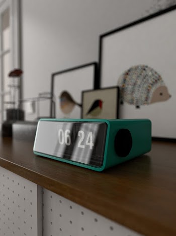 Close-Up Photo of Teal Digital Clock