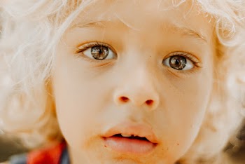 Close-Up Photo Of Toddler