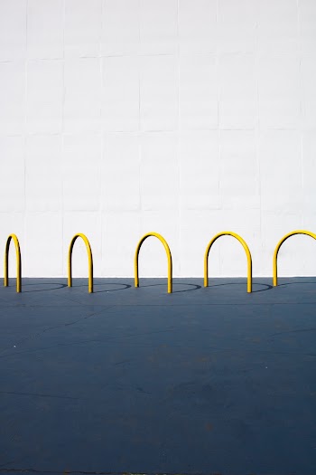 Close Up Photo of U-shaped Barriers