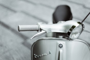 Close-Up Photo of Vespa Motorcycle