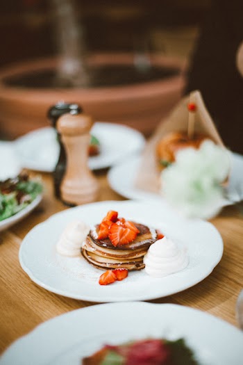 Close-up Photo of White Ceramic Plate with Dessert